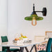 Light Up Your Space With Industrial Chic: The 1 - Light Black Sconce Clear/Green Glass