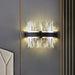 Noelle Elegance Meets Sparkling Illumination: The Black Led Wall Sconce With Crystal Shade Clear