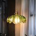 Retro Charm Meets Modern Functionality: The Green Glass Scalloped Pendant Light