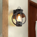 Industrial Elegance - Adjustable Black Sconce With Seedy Glass Shade