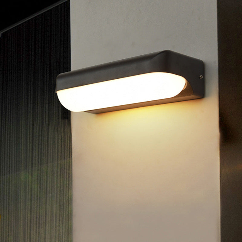 Sloane Modern Glow: Black Capsule Wall Sconce