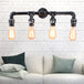 Eden Your Space With Industrial Charm: The 4 - Bulb Wall Sconce Aged Silver