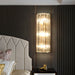 Ariana’s Golden Embrace: Sparkling Elegance Meets Modern Functionality Wall Light