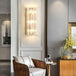 Ariana’s Golden Embrace: Sparkling Elegance Meets Modern Functionality Wall Light