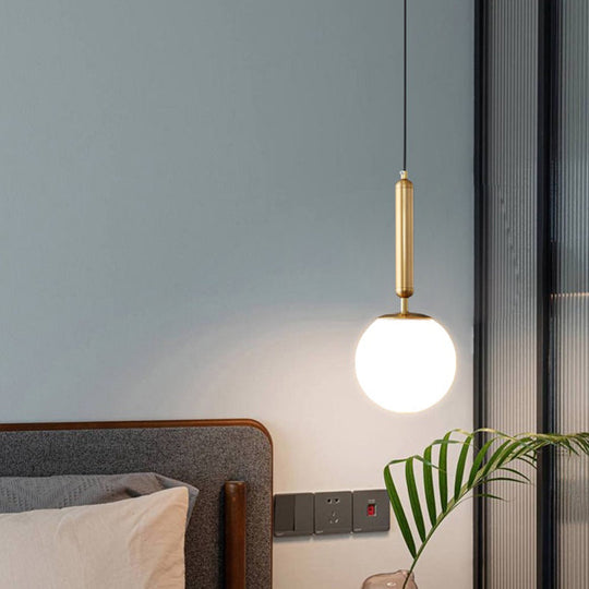 Modern Elegance Meets Warmth: Opal Glass Globe Pendant Light Gold