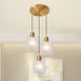 Leilani Modern Brass Pendant: Prismatic Glass Meets Chic Style