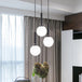 Brynn Modern White Glass Globe Pendant: Illuminate Your Space With Timeless Elegance