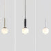 Brynn Modern White Glass Globe Pendant: Illuminate Your Space With Timeless Elegance