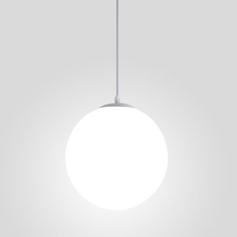 Makayla Elegance Meets Versatility: White Glass Globe Pendant