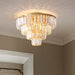 Eleanor’s Modern Crystal Chandelier: Tiered Elegance In Gold (5 Or 6 Lights)