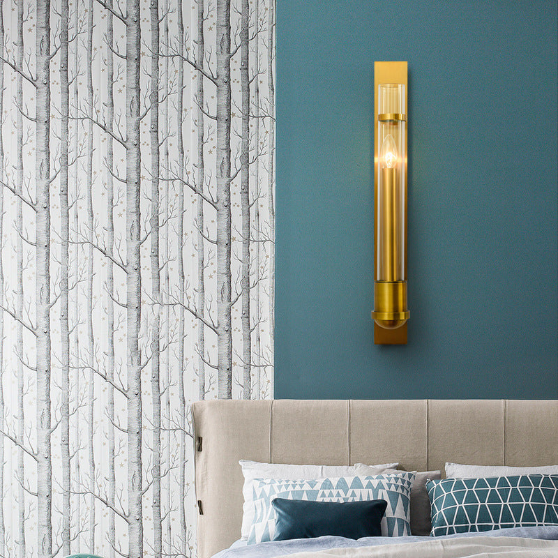 Modern Elegance Meets Warm Illumination: The Clear Glass Wall Sconce