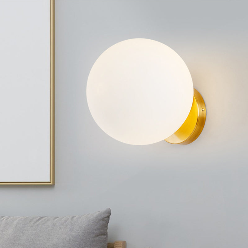 Modern Elegance Meets Warm Illumination: The Gold Opal Glass Wall Sconce