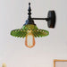 Light Up Your Space With Industrial Chic: The 1 - Light Black Sconce Clear/Green Glass