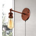 Rustic Charm Meets Modern Functionality: The Copper Halo Wall Sconce