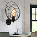 Elevate Your Dining Room With Industrial Charm: The Black Metal Ring Wall Sconce