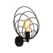 Elevate Your Dining Room With Industrial Charm: The Black Metal Ring Wall Sconce