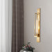 Modern Elegance Meets Warm Illumination: The Gold Metal Linear Sconce With Ribbed Glass